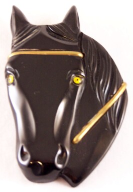 BP660 front facing black bakelite horse head pin